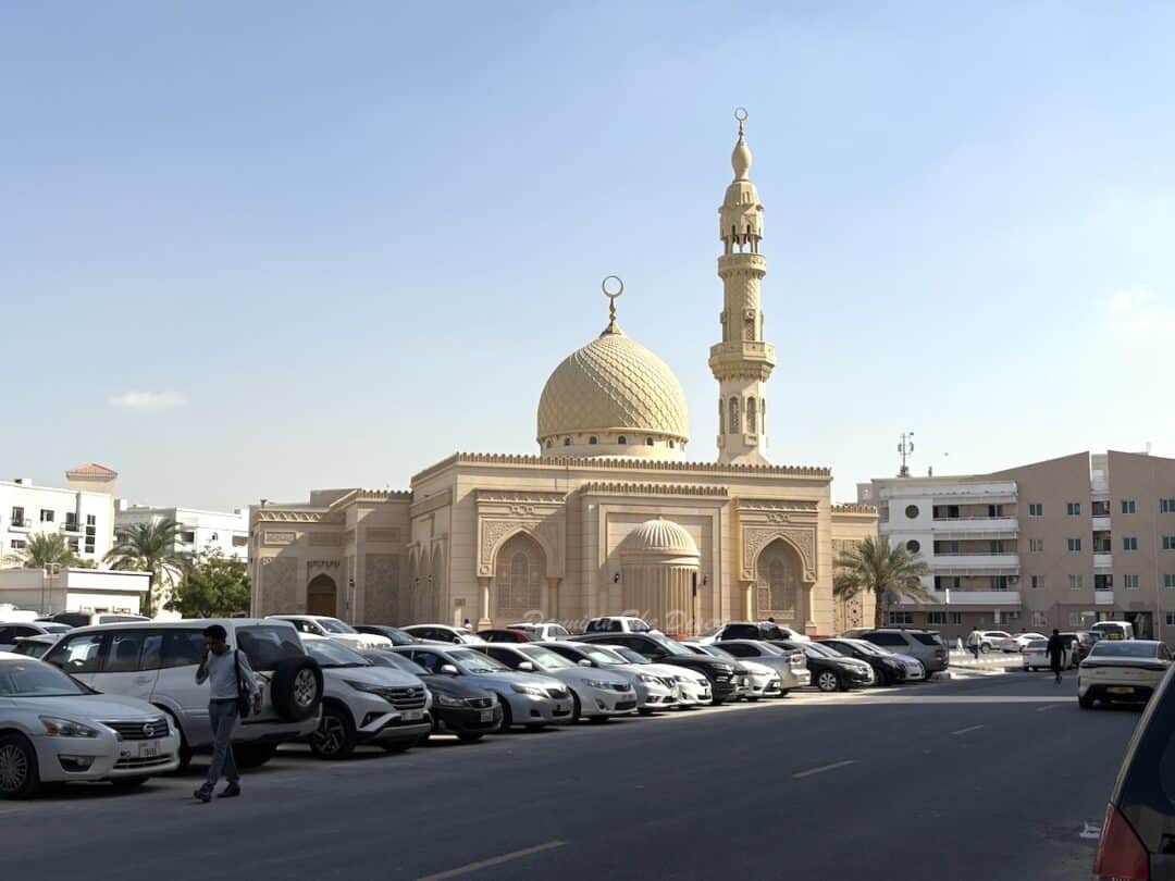 Tamim Al Dari mosque from the outside during the day with cars parked outside for Friday prayer in Al Muhaisnah 4 area Dubai