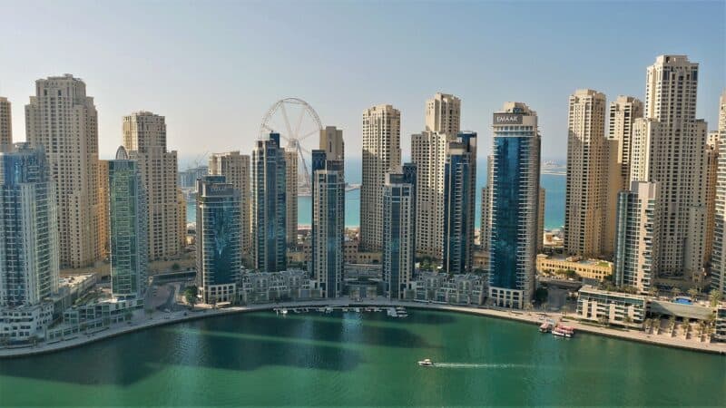 Dubai Marina skyline in daylight with view of Jumeirah Beach Residence (JBR) and Ain Dubai