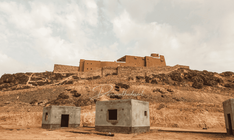 A'arif Fort on top of a hill with building works at the bottom and buildings not yet complete that are planned to be part of a historical exhibition