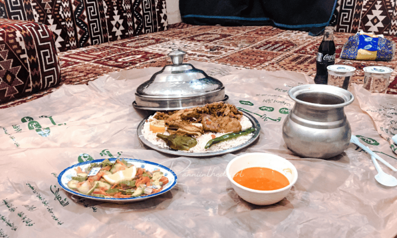 Traditional khaleeji food served on the floor for a family to sit together in a traditional Najd restaurant. Saudi restaurants are also popular in Dubai.