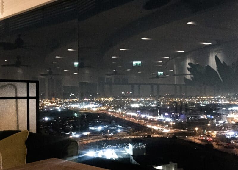 View from our table and out of the window of Al Dawaar Rotating restaurant. Seeing Dubai lit up at night.
