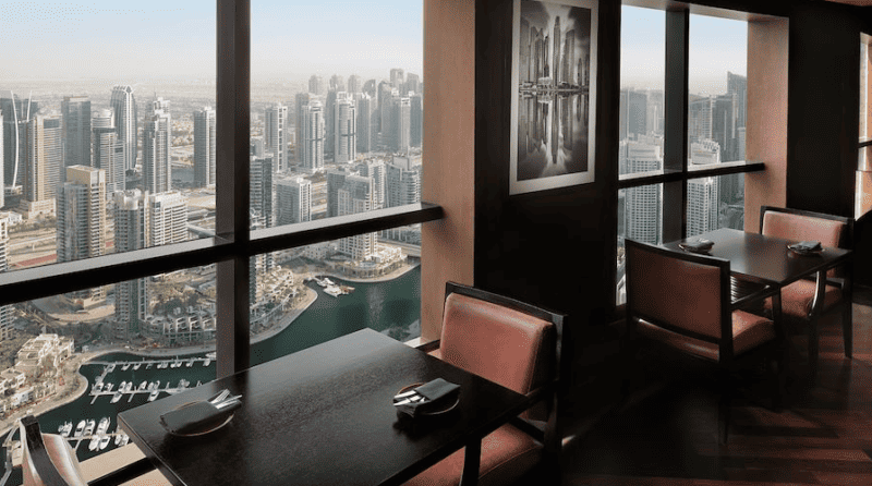A few tables sat close to the windows at The Observatory Bar and Grill, overlooking Dubai Marina skyline from high up on a clear day.