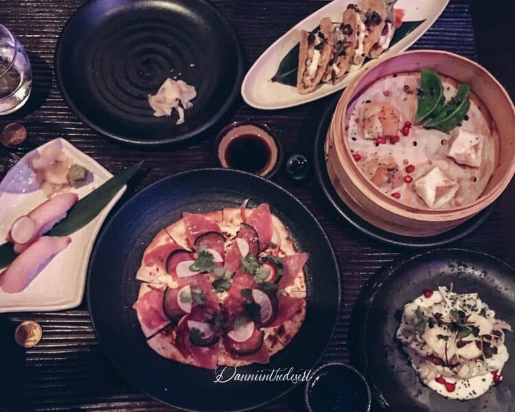 A selection of dishes from a restaurant in Downtown Dubai laid out on the table