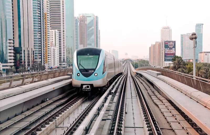 The Dubai metro on the track with the Trade Centre and Sheikh Zayed Road  area in the background