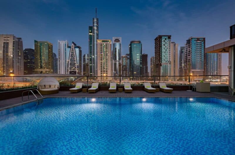 View from the outdoor swimming pool at Millennium Place Dubai Marina, looking towards Jumeirah Lake Towers