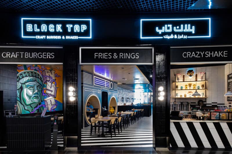 black tap dubai from the outside looking into the interiors of the restaurant