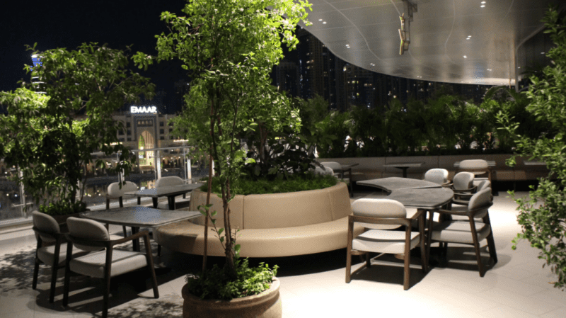 The outside terrace of OFC at Fashion Avenue of Dubai Mall with a view of Dubai Foutains
