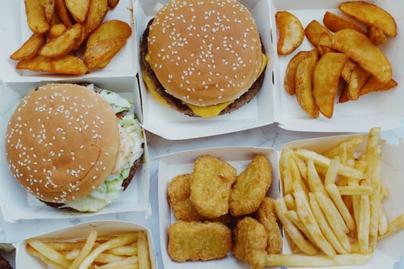 Take away food in cartons such as burger, friends, wedges and chicken nuggets that people might be tempted to eat on public transport in Dubai