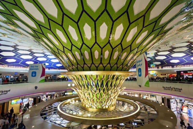 Inside abu dhabi international airport terminal 3 with their famous honeycomb designed roof visiable from the food court and Abu Dhabi duty free