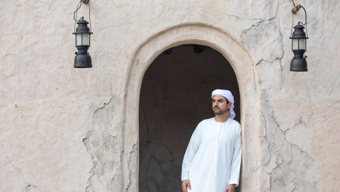 Emirati man stood in the cultural district of Dubai, part of Dubai's culture and history