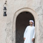 Emirati man stood in the cultural district of Dubai, part of Dubai's culture and history