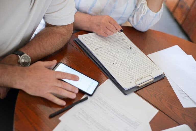 couple working out the bills together on a table