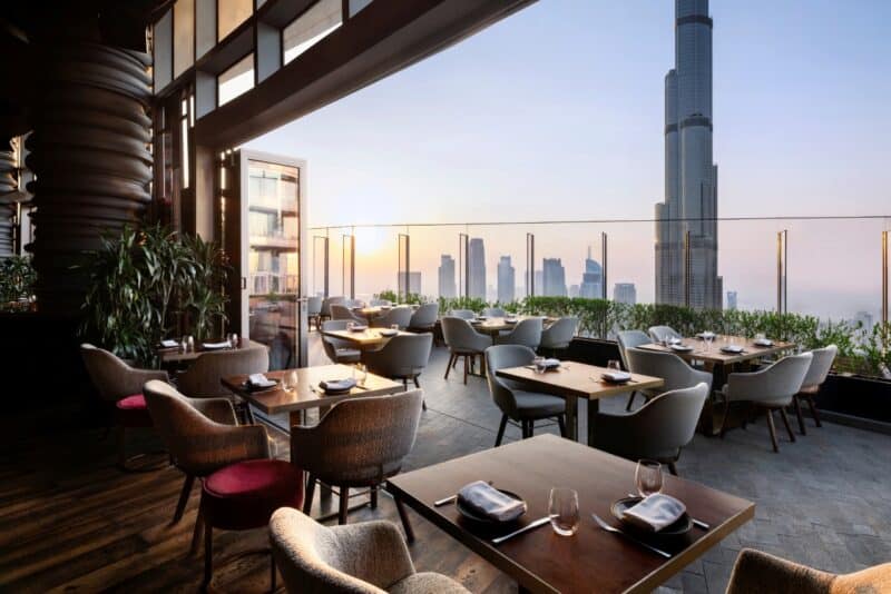 A high up outdoor restaurant terrace overlooking the Burj Khalifa at Ce La Vi Dubai