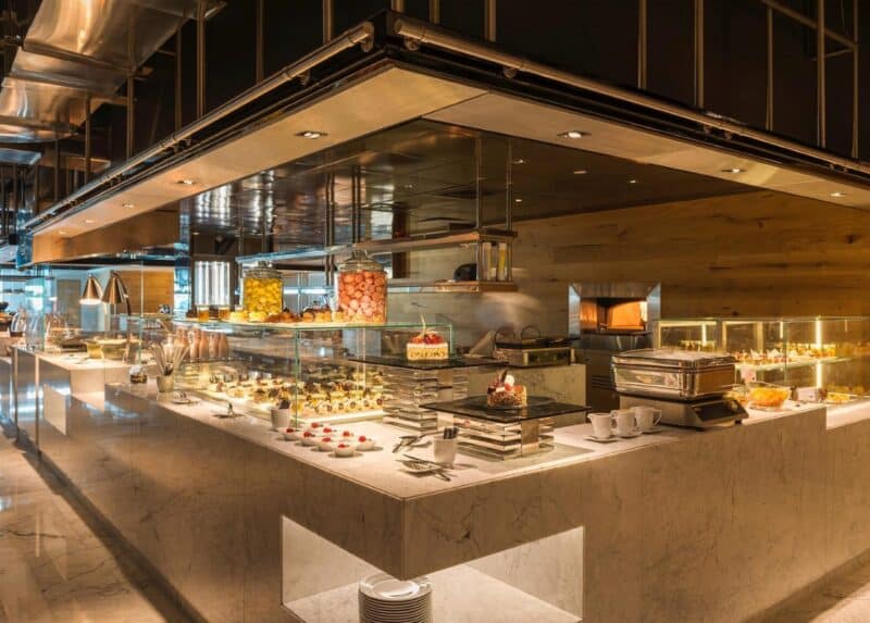How the buffet is served in the modern interiors with lots of stainless steel at Feast Restaurant Dubai