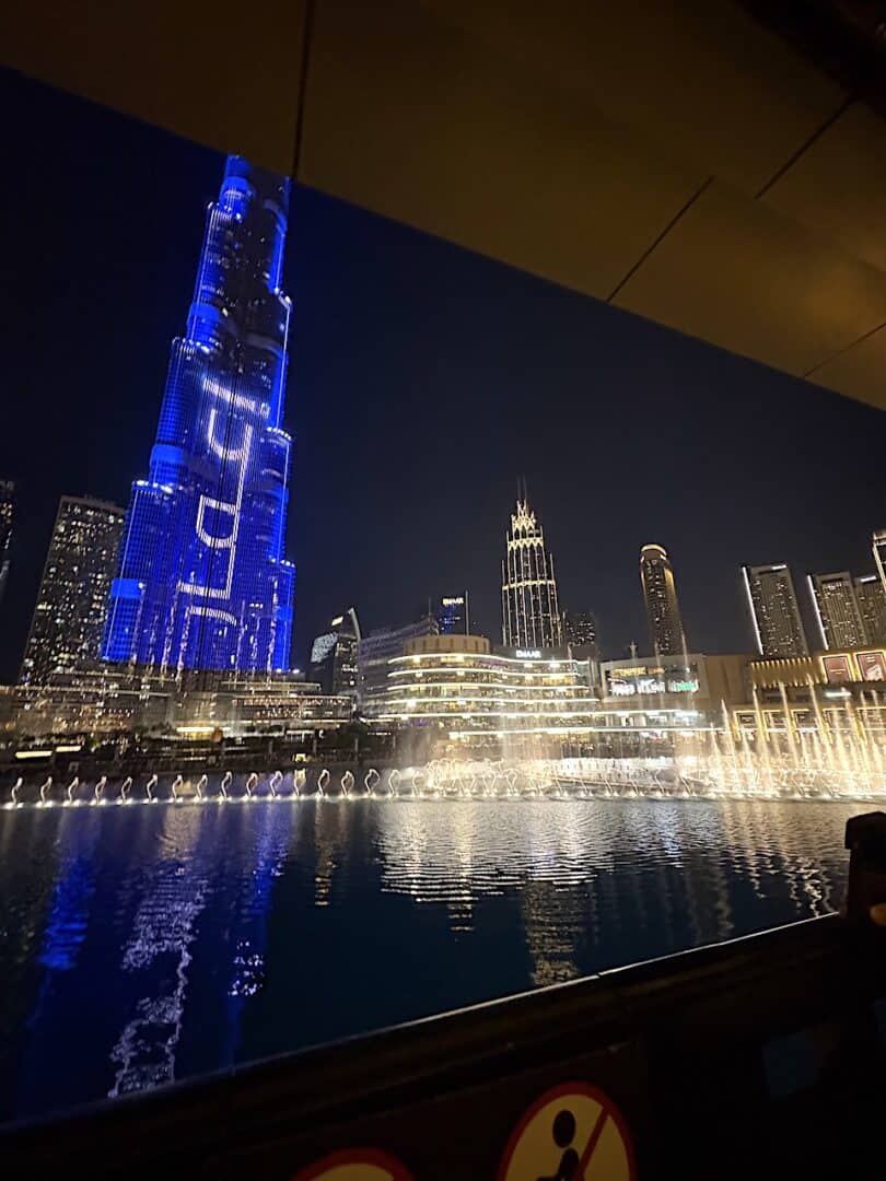 The view of Dubai Fountain and Burj Khalifa with the Burj Khalifa lake from the terrace at Time Out Market