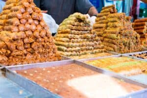 Arabic sweets laid out in a dessert shop in Dubai