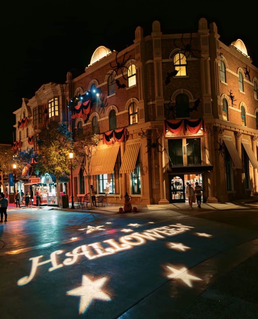 One of the streets at Motiongate all decorated for Halloween with light projectors on the road