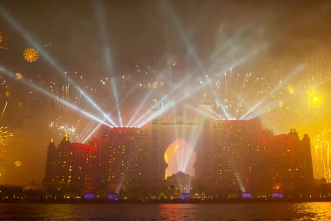 Golden fireworks and lasers shooting out from Atlantis Resort for New Year's Day