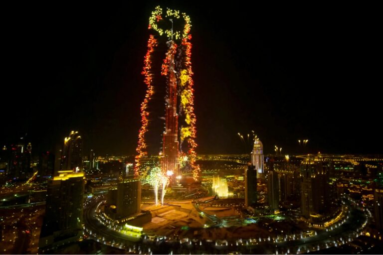 Burj Khalifa red and grey fireworks firing out from the Burj Khalifa on New Year's in Dubai